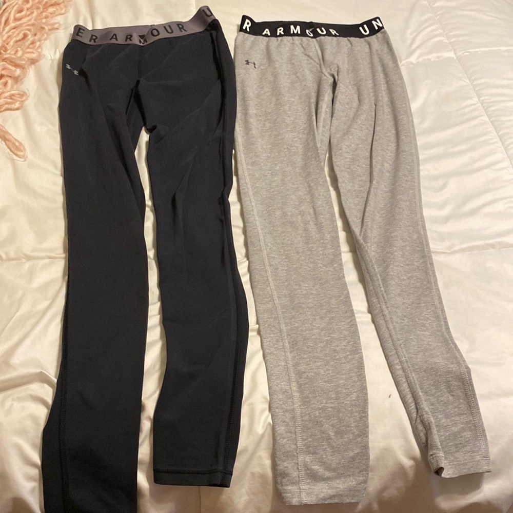 Two pair under armor leggings/base layer/workout tights. Navy and gray.